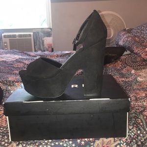 Black suede platform heels